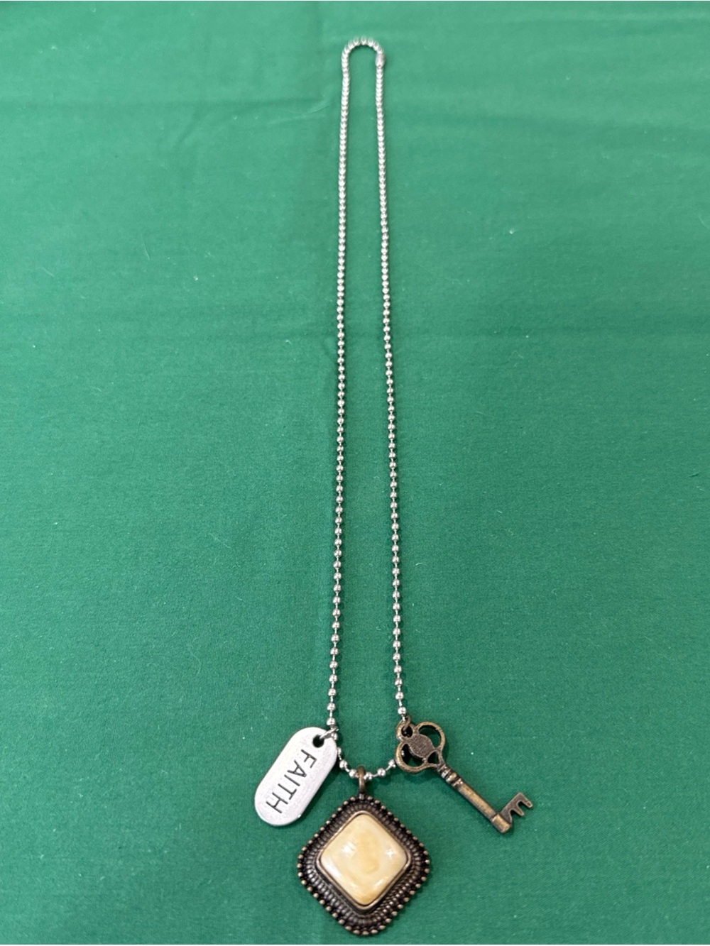 SilverTone Ball Chain Necklace With 3 Charms. 79F